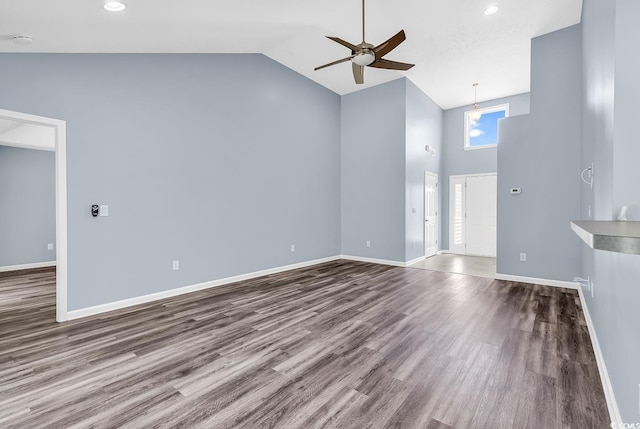 389 Barton Loop, Myrtle Beach, SC 29579 - unfurnished living room featuring high vaulted ceiling, a ceiling fan, wood finished floors, baseboards, and recessed lighting