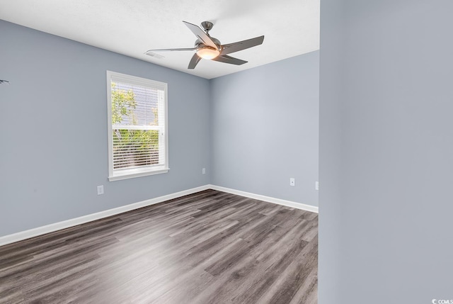 389 Barton Loop, Myrtle Beach, SC 29579 - empty room with dark wood-style floors, a ceiling fan, and baseboards