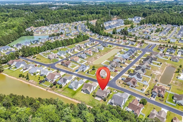 389 Barton Loop, Myrtle Beach, SC 29579 - aerial overview of property's location with a large body of water, nearby suburban area, and a forest