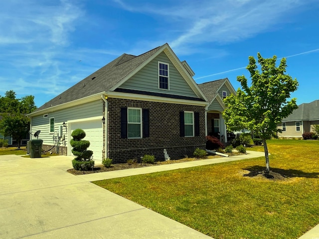 craftsman house featuring a garage, a front lawn, roof with shingles, brick siding, and driveway