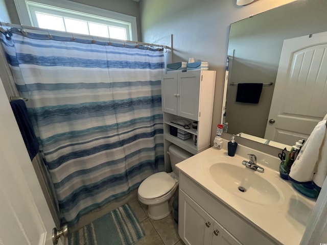bathroom featuring tile patterned flooring, curtained shower, toilet, and vanity