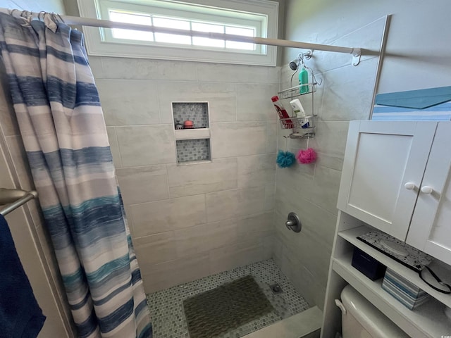 bathroom featuring a stall shower