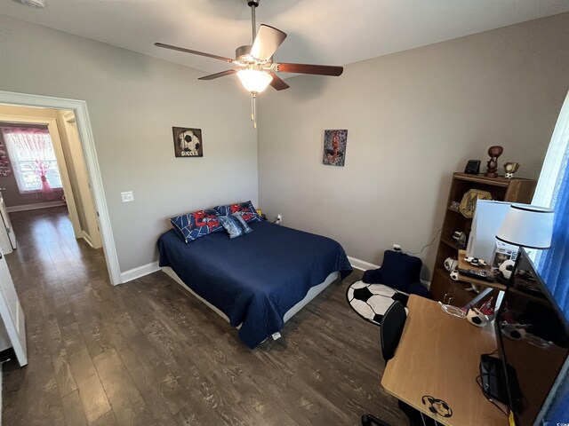 4008 Tupelo Ct, Conway, SC 29526 - bedroom featuring baseboards, ceiling fan, and wood finished floors