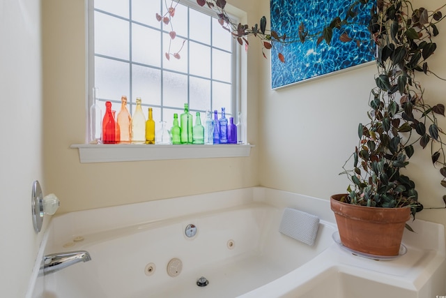 full bath featuring a whirlpool tub