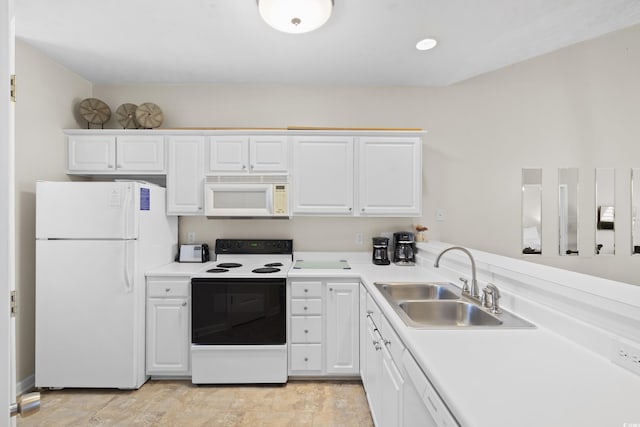 kitchen featuring a sink, light countertops, white appliances, and white cabinetry