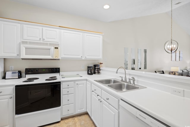 kitchen with an inviting chandelier, a sink, white appliances, light countertops, and white cabinetry