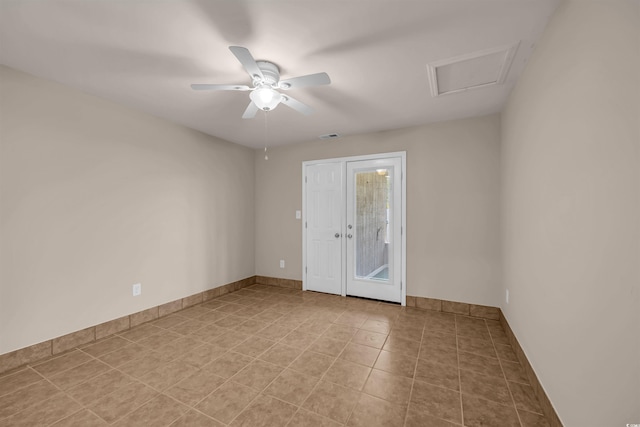 1361 Turkey Ridge Rd Unit C, Surfside Beach, SC 29575 - empty room with ceiling fan, baseboards, tile patterned flooring, and attic access