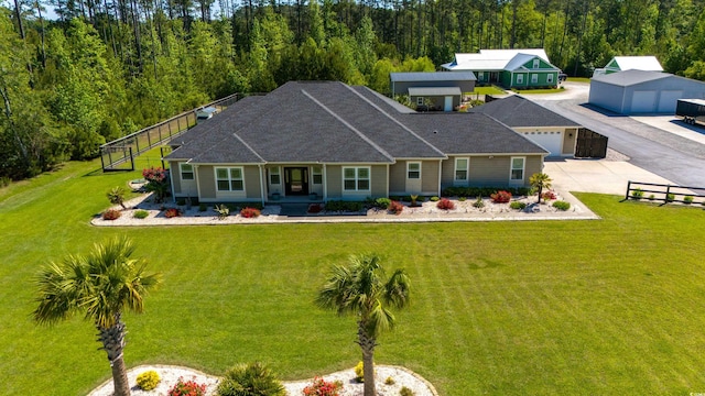 exterior space with a lawn and concrete driveway