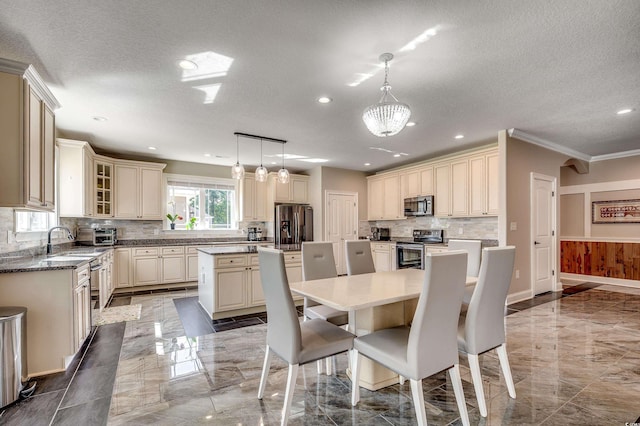 dining room with recessed lighting, a textured ceiling, and marble finish floor