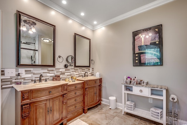 bathroom featuring double vanity, a sink, ornamental molding, and tasteful backsplash