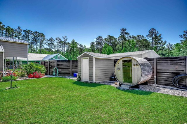 view of shed featuring fence