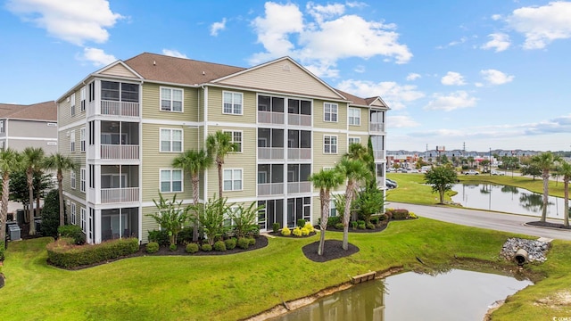 view of building exterior featuring a water view