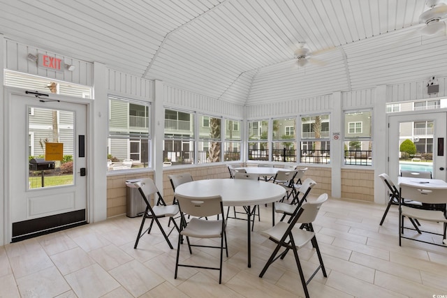 sunroom / solarium with lofted ceiling