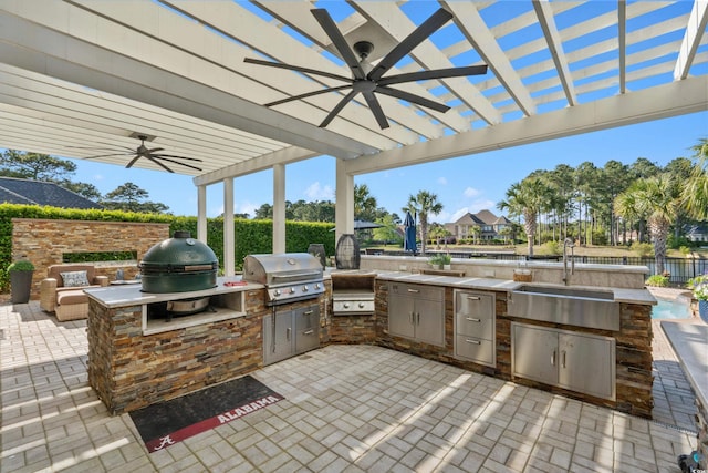 256 Shoreward Dr, Myrtle Beach, SC 29579 - view of patio featuring area for grilling, ceiling fan, a sink, fence, and a grill