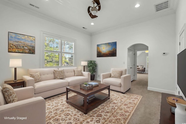 256 Shoreward Dr, Myrtle Beach, SC 29579 - living room with crown molding, light carpet, arched walkways, baseboards, and visible vents