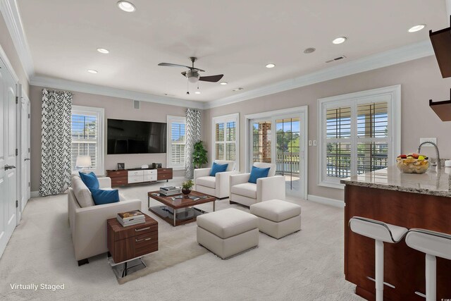 256 Shoreward Dr, Myrtle Beach, SC 29579 - living room with crown molding, light carpet, and visible vents