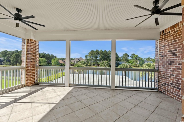 256 Shoreward Dr, Myrtle Beach, SC 29579 - unfurnished sunroom featuring tile patterned flooring and ceiling fan