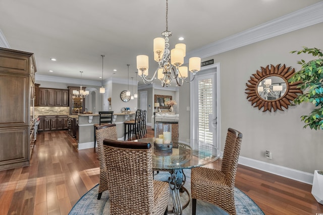 256 Shoreward Dr, Myrtle Beach, SC 29579 - dining room with dark wood-type flooring, recessed lighting, and a notable chandelier