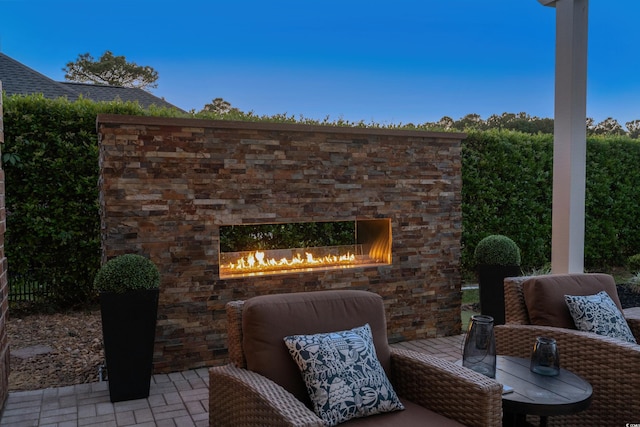 256 Shoreward Dr, Myrtle Beach, SC 29579 - view of patio / terrace featuring an outdoor stone fireplace