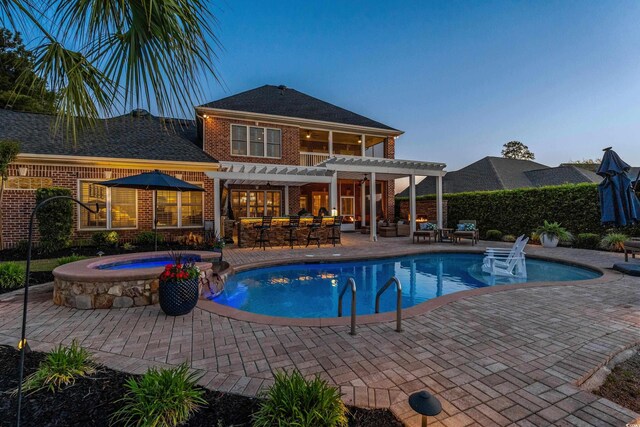 256 Shoreward Dr, Myrtle Beach, SC 29579 - view of pool with a patio area, a pool with connected hot tub, a pergola, and fence