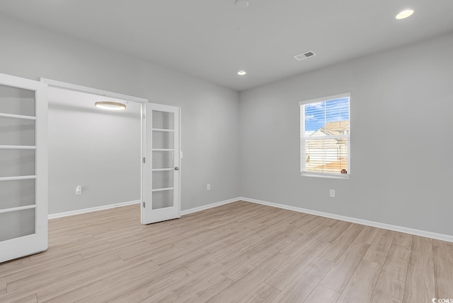 3119 Hannon Dr, Myrtle Beach, SC 29579 - spare room featuring recessed lighting, french doors, light wood-type flooring, and visible vents