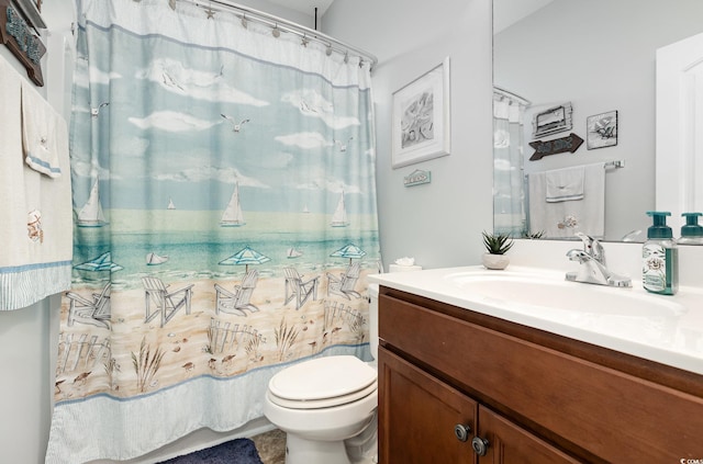 full bathroom featuring toilet, a shower with shower curtain, and vanity