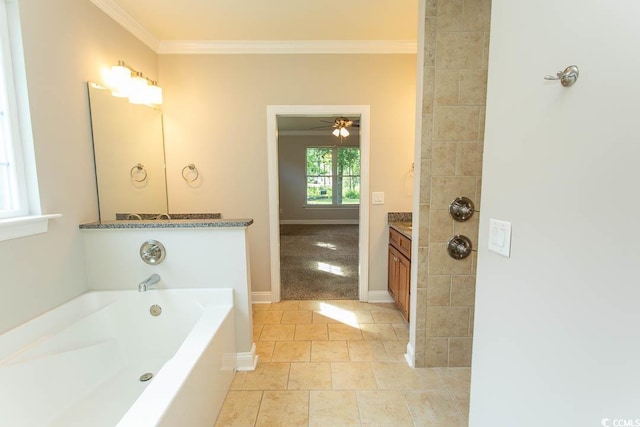 full bathroom featuring vanity, ornamental molding, baseboards, a bath, and a ceiling fan