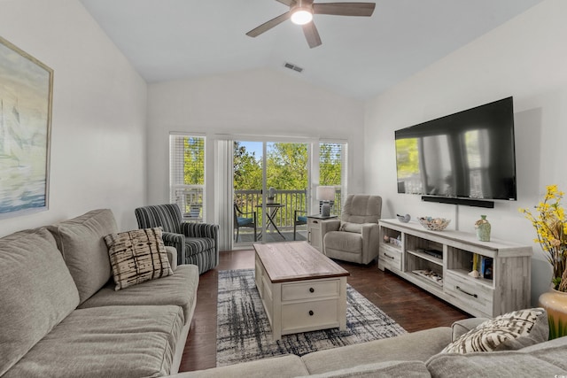 living room with a ceiling fan, visible vents, dark wood-style floors, and lofted ceiling