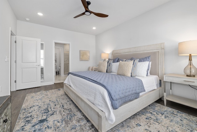 bedroom with ensuite bath, recessed lighting, baseboards, a ceiling fan, and wood finished floors