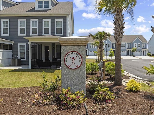 community sign with a residential view