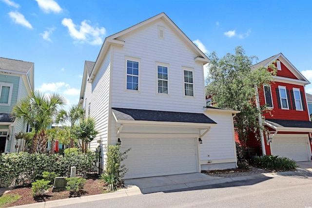 1359 Peterson St, Myrtle Beach, SC 29577 - view of front of property featuring a garage, roof with shingles, and concrete driveway