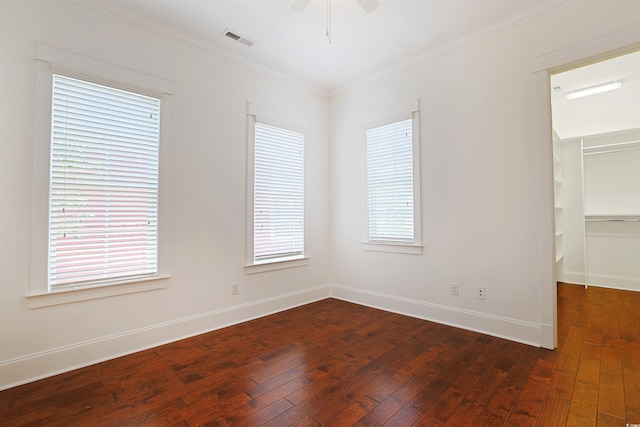 1359 Peterson St, Myrtle Beach, SC 29577 - spare room featuring dark wood-style floors, crown molding, a ceiling fan, and baseboards