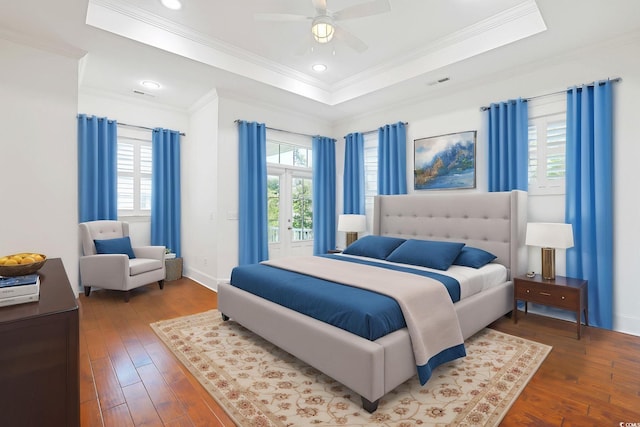 1359 Peterson St, Myrtle Beach, SC 29577 - bedroom with a raised ceiling, hardwood / wood-style flooring, ornamental molding, ceiling fan, and baseboards