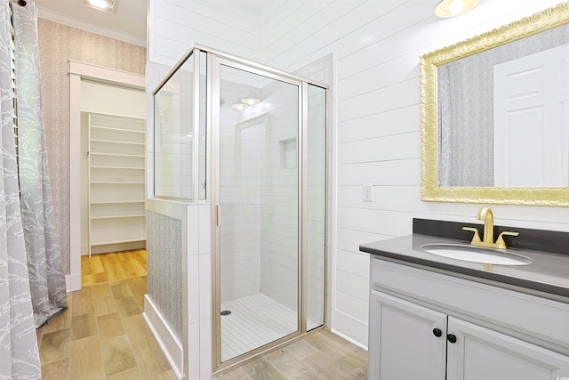 1359 Peterson St, Myrtle Beach, SC 29577 - bathroom featuring crown molding, a shower stall, wood finished floors, and vanity