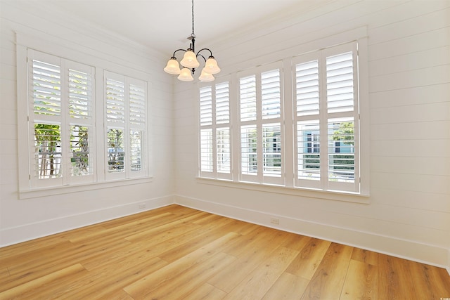 1359 Peterson St, Myrtle Beach, SC 29577 - unfurnished dining area featuring a chandelier, wood finished floors, and baseboards
