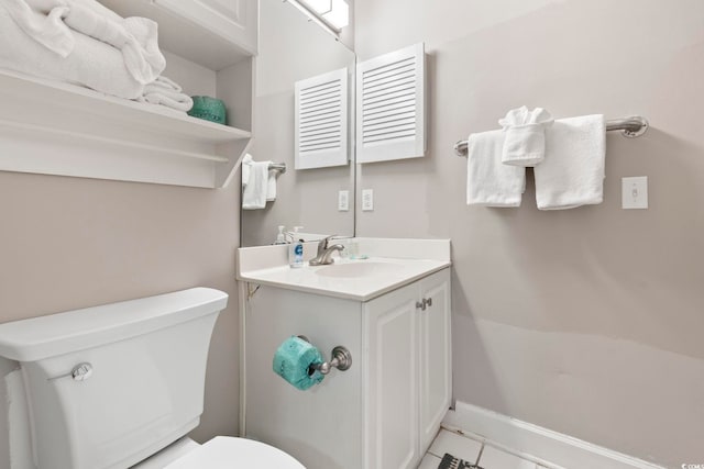 4771 Wild Iris Dr Unit 103, Myrtle Beach, SC 29577 - bathroom featuring toilet, baseboards, and vanity