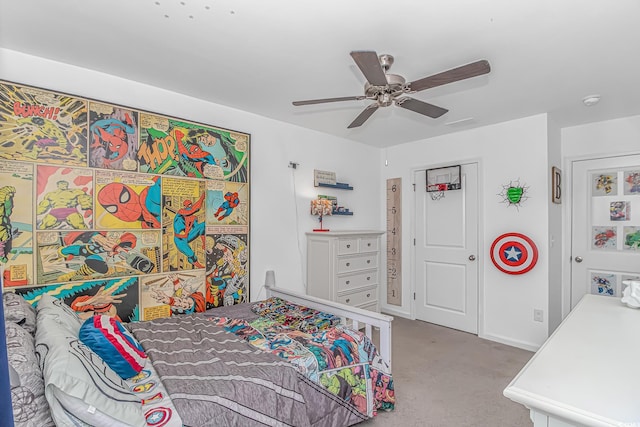 carpeted bedroom featuring baseboards and ceiling fan