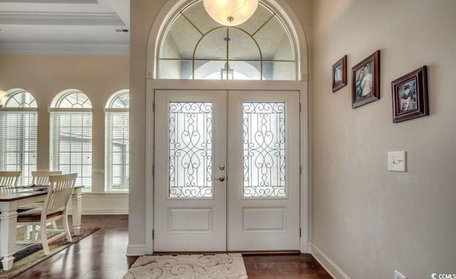 9060 Abingdon Dr, Myrtle Beach, SC 29579 - entryway with french doors, ornamental molding, baseboards, and dark wood finished floors