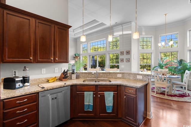 9060 Abingdon Dr, Myrtle Beach, SC 29579 - kitchen featuring stainless steel dishwasher, a peninsula, a healthy amount of sunlight, and a sink