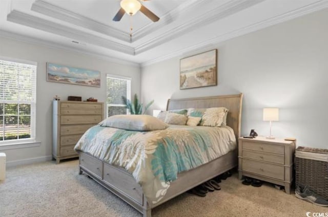 9060 Abingdon Dr, Myrtle Beach, SC 29579 - bedroom featuring crown molding, a raised ceiling, carpet floors, and multiple windows