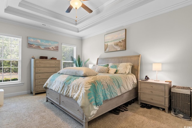 9060 Abingdon Dr, Myrtle Beach, SC 29579 - carpeted bedroom with visible vents, ornamental molding, baseboards, ceiling fan, and a tray ceiling