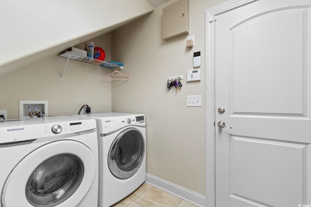 9060 Abingdon Dr, Myrtle Beach, SC 29579 - laundry room with baseboards, laundry area, light tile patterned flooring, and independent washer and dryer