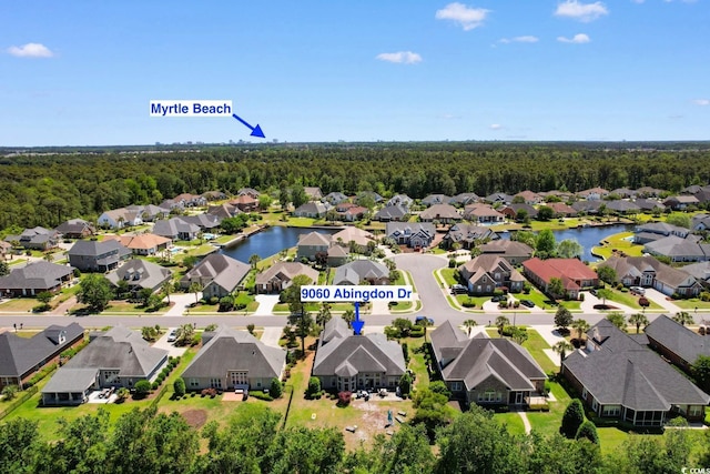 9060 Abingdon Dr, Myrtle Beach, SC 29579 - aerial view featuring a water view, a view of trees, and a residential view