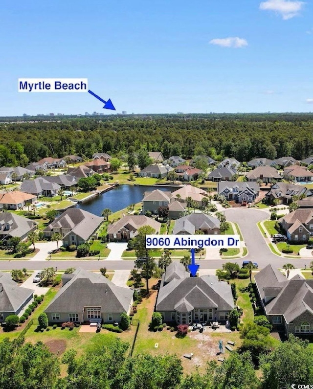 9060 Abingdon Dr, Myrtle Beach, SC 29579 - drone / aerial view featuring a residential view and a view of trees