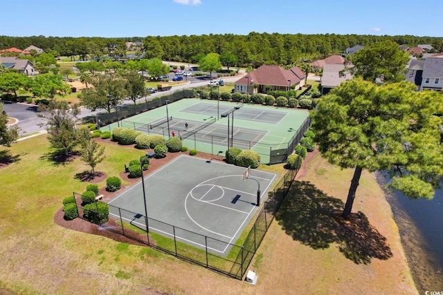 9060 Abingdon Dr, Myrtle Beach, SC 29579 - view of basketball court featuring a tennis court, fence, community basketball court, and a residential view