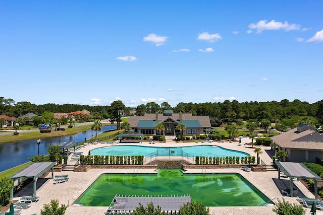 9060 Abingdon Dr, Myrtle Beach, SC 29579 - community pool featuring a patio and a water view