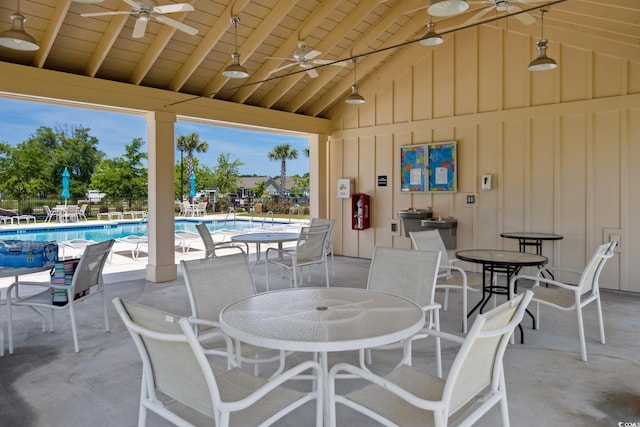 view of patio / terrace with a community pool and a ceiling fan