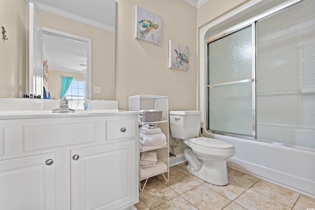 bathroom featuring toilet, ornamental molding, bath / shower combo with glass door, and vanity