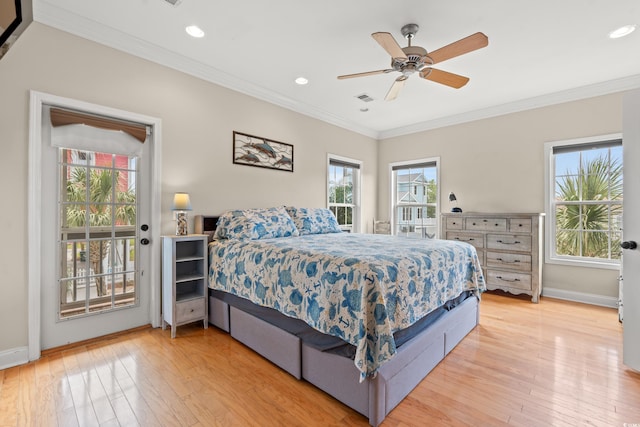 bedroom featuring access to outside, light wood-style floors, recessed lighting, visible vents, and ornamental molding