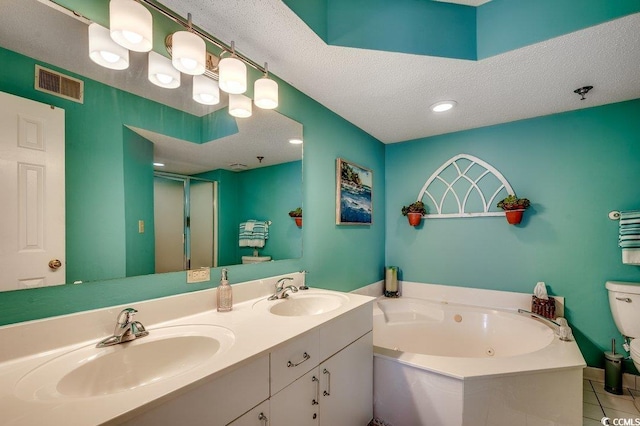 full bath with a sink, a whirlpool tub, visible vents, and tile patterned floors